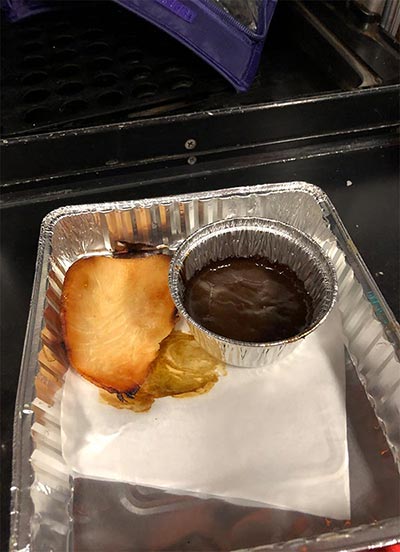 piece of overcooked turkey and some dried up gravy